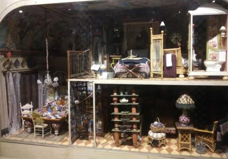 The Mackenzie-Childs dollhouse where DelFavero first saw the chair; you can glimpse it on the lower left-hand side of the picture.