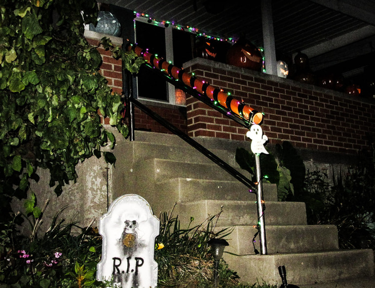 Andrew Beattie decorates his porch in Cincinnati, Ohio, every year for Halloween and dresses up to hand out candy for trick-or-treaters. 