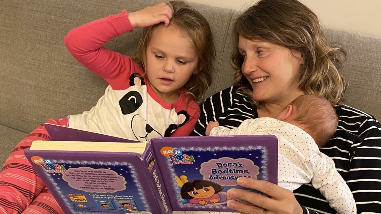 Assemblymember Buffy Wicks, D-Oakland, reads to her daughters, 3-year-old Josephine and 6-week-old Eloise.