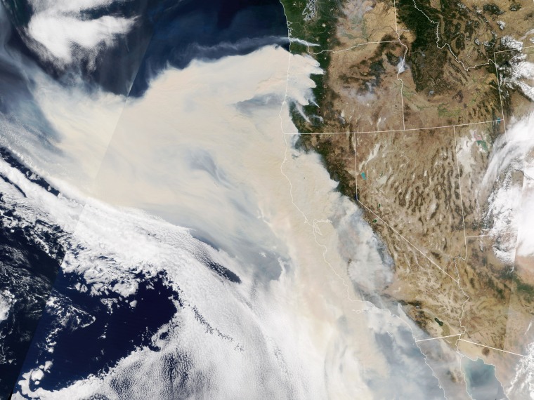 Thick smoke streams from intense fires in Oregon and California on Sept. 9. The smoke was so thick and widespread that it was easily visible 1 million miles away from Earth.