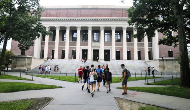 Students near the Widener Library at Harvard University in Cambridge, Mass., on Aug. 13, 2019.
