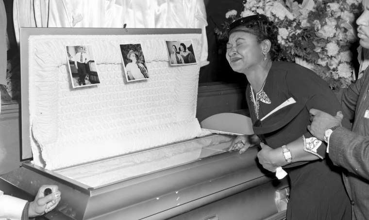 Mamie Till Mobley weeps at the funeral for her son, Emmett Till, on Sept. 6, 1955, in Chicago.