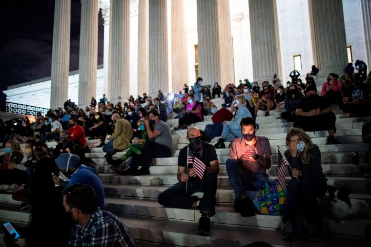 Image: People gather in front of the U.S. Supreme Court following the death of U.S. Supreme Court Justice Ruth Bader Ginsburg, in Washington