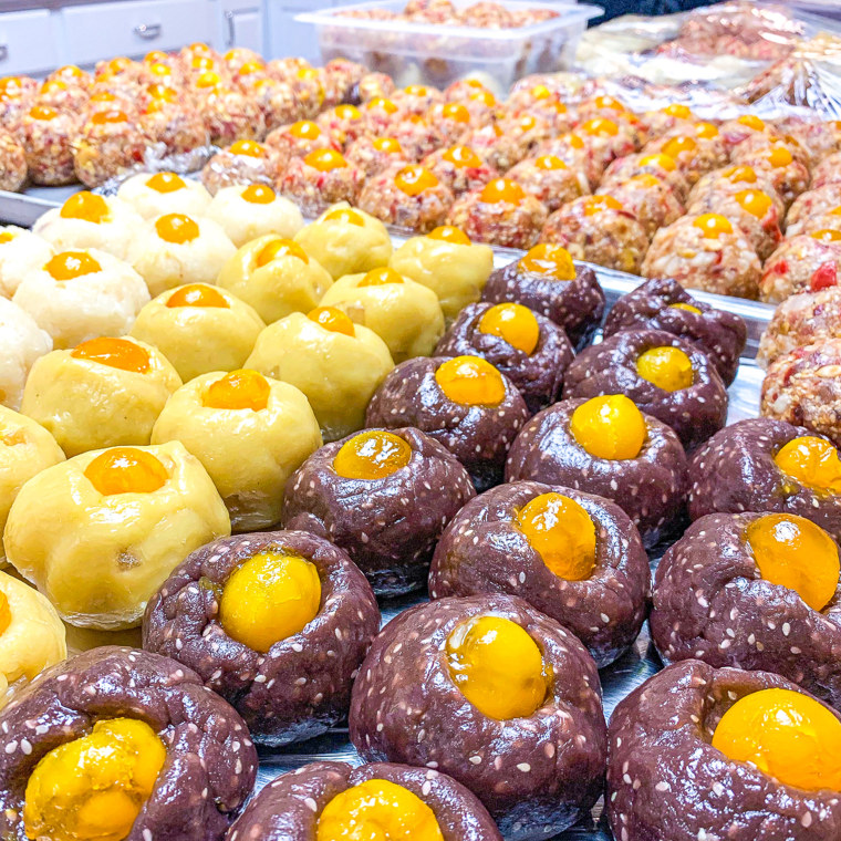 Mooncake fillings with egg yolks before they're combined with the outer dough layer.