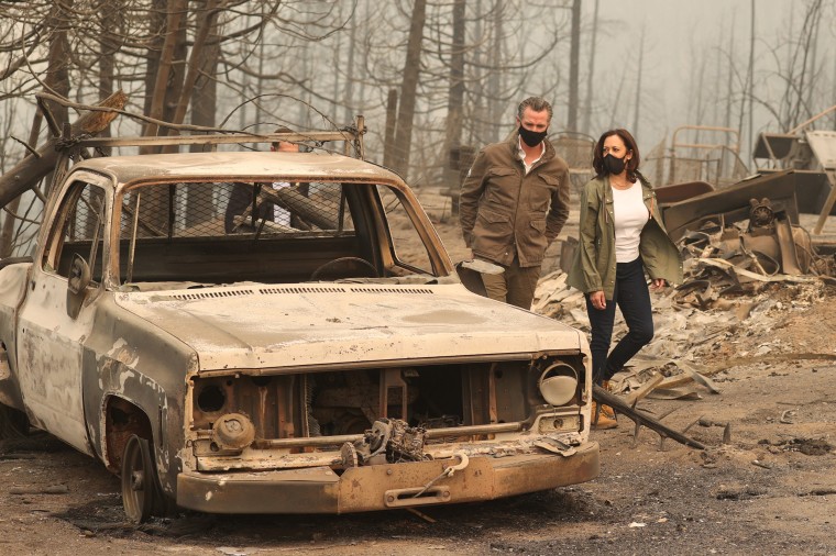 Image: Kamala Harris meets with California Governor Gavin Newsom at the site of the Creek Fire in Auberry