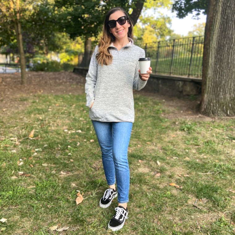 woman wearing gray amazon pullover sweatshirt outside