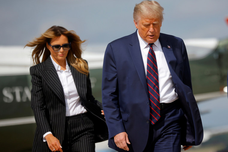 Image: President Donald Trump and first lady Melania Trump board Air Force One as they depart Washington on campaign travel to participate in the first presidential debate, Joint Base Andrews, Maryland