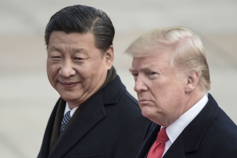 Image: China's President Xi Jinping and President Donald Trump attend a welcome ceremony at the Great Hall of the People in Beijing.