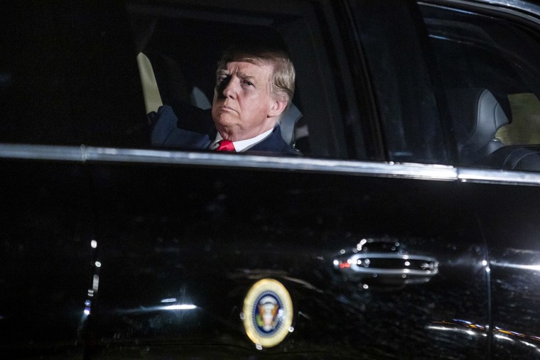 Image: President Donald Trump rides in the presidential limo to deliver his State of the Union at the Capitol on Feb. 5, 2019.