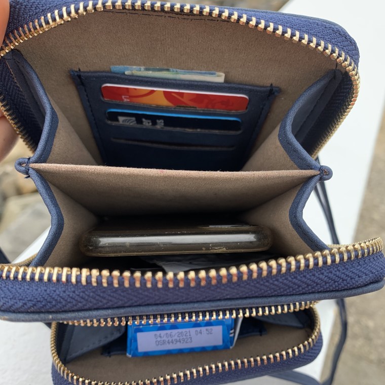 the crossbody cell phone bag holds more than it looks like it holds