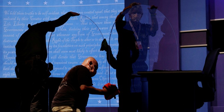 Image: Plexiglass installed onstage for the vice presidential debate in Salt Lake City