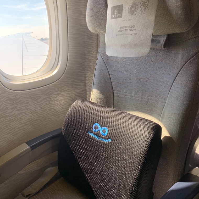 using my Everlasting Comfort lumbar support cushion on my Emirates flight from Lisbon to Dubai