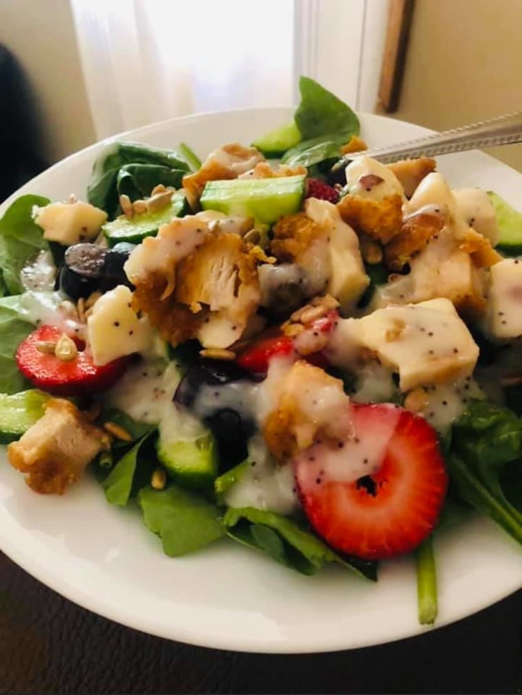 Tina Perretta's "red bag chicken salad" includes all Aldi ingredients: RBC, strawberries, grapes, cucumbers, cranberries, cheddar cheese, sesame seeds and poppy seed dressing.
