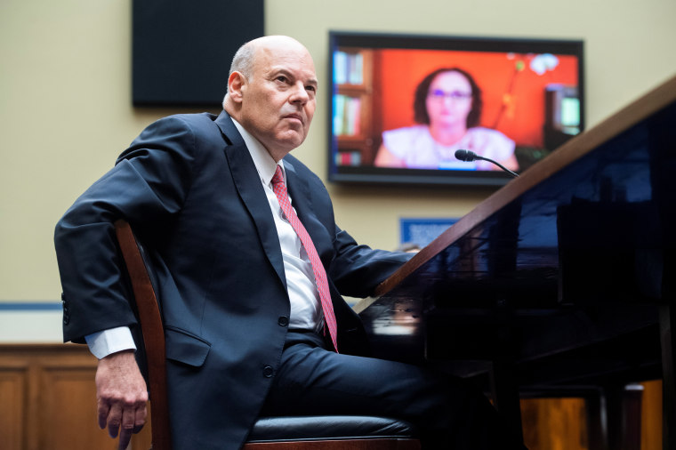 Image: Rep. Katie Porter questions Postmaster General Louis DeJoy during the House Oversight and Reform Committee hearing in Washington