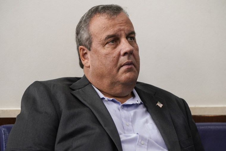 Image: Former New Jersey Governor Chris Christie listens as President Donald Trump speaks during a news conference in the Briefing Room of the White House