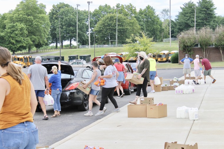 Second Harvest Food Bank of Middle Tennessee volunteers at mobile distribution site in Donelson provide fresh produce, dairy, and shelf stable items to families.