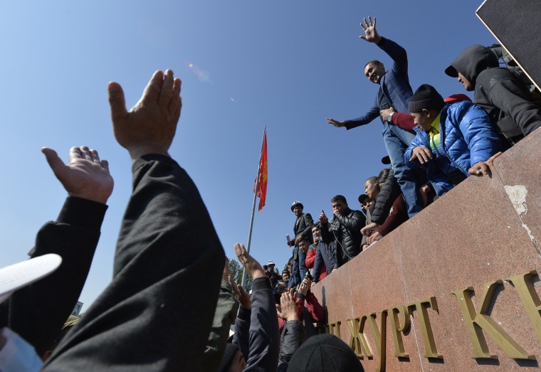 Image: People protest during a rally on the central square in Bishkek, Kyrgyzstan