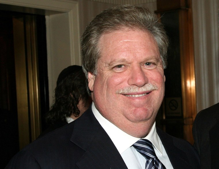 Image: Elliott Broidy poses for a photo at an event in New York.