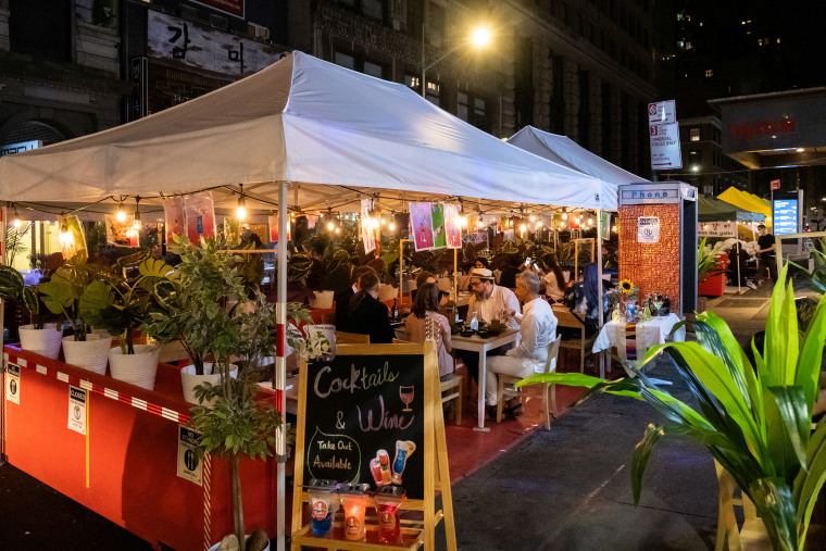 People enjoy outdoor dining amid the coronavirus disease (COVID-19) outbreak in Manhattan