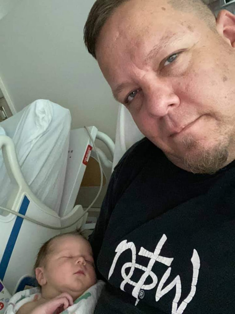 Brad Sparks with his newborn son, Nixon Daniel.