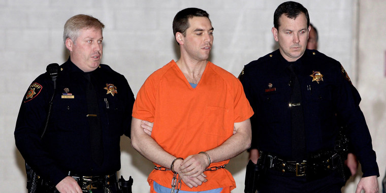 Image: Image: FILE PHOTO: Scott Peterson transported to San Quentin Prison Death Row.