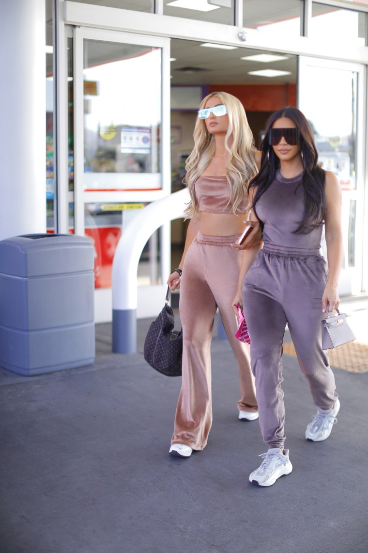 Kim Kardashian & Paris Hilton model Skims velour tracksuits