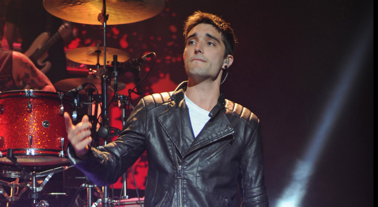 Tom Parker of The Wanted performs in 2014.