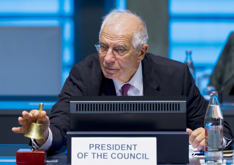 Image: European Union foreign policy chief Josep Borrell rings a bell to signal the start of a meeting of European Union foreign ministers at the European Council building in Luxembourg