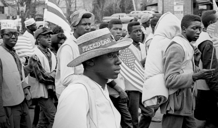 Image: People march from Selma to Montgomery, Ala., in support of voting rights on March 21, 1965.