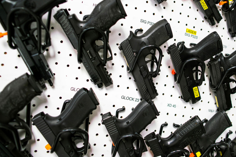 Guns are displayed at Shore Shot Pistol Range gun shop, amid fears of the global growth of coronavirus disease (COVID-19) cases, in Lakewood Township, New Jersey