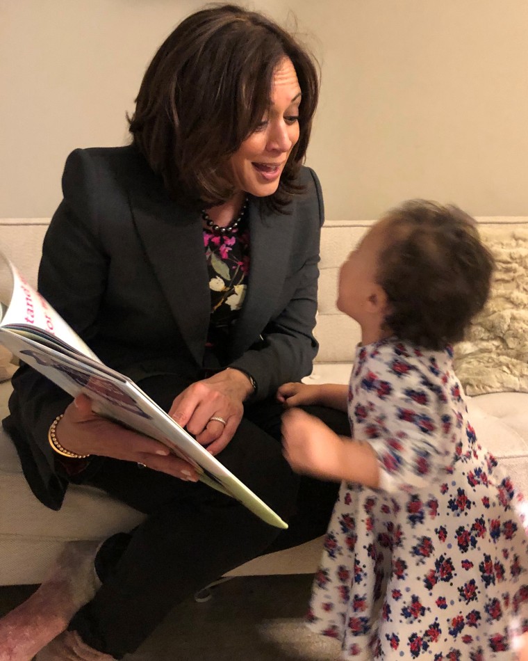 Sen. Kamala Harris reading to Meena Harris' daughter.