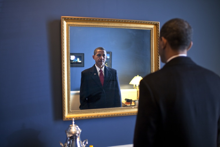 Image: President-elect Barack Obama was about to walk out to take the oath of office on Jan. 20, 2009. Backstage at the Capitol, he took one last look at his appearance in the mirror.