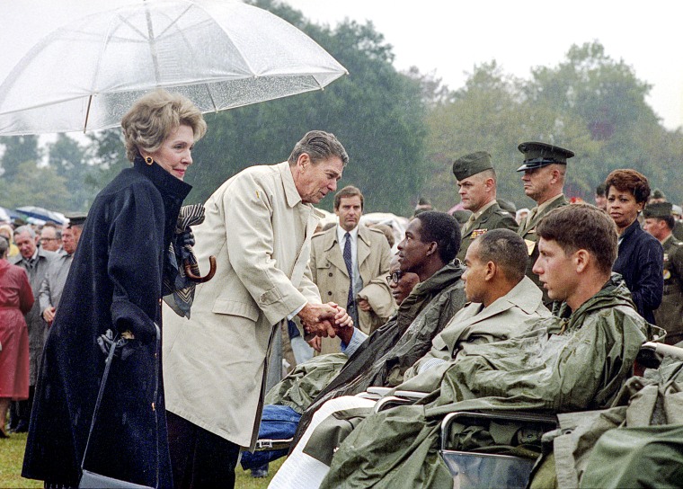 Image: President Reagan and Nancy Reagan at Memorial Service for servicemen killed and wounded in Lebanon and Grenada at Camp Lejeune Marine Corps Base, N.C., Nov. 4, 1983