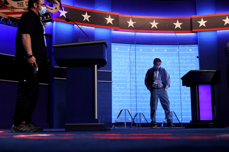 Image: Transparent plexiglass partitions separate the candidate lecterns used for the second presidential debate at Belmont University in Nashville on Wednesday.