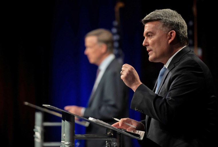 Image: Republican U.S. Sen. Cory Gardner participates with Democratic challenger and former Colorado Gov. John Hickenlooper in the final debate in Fort Collins