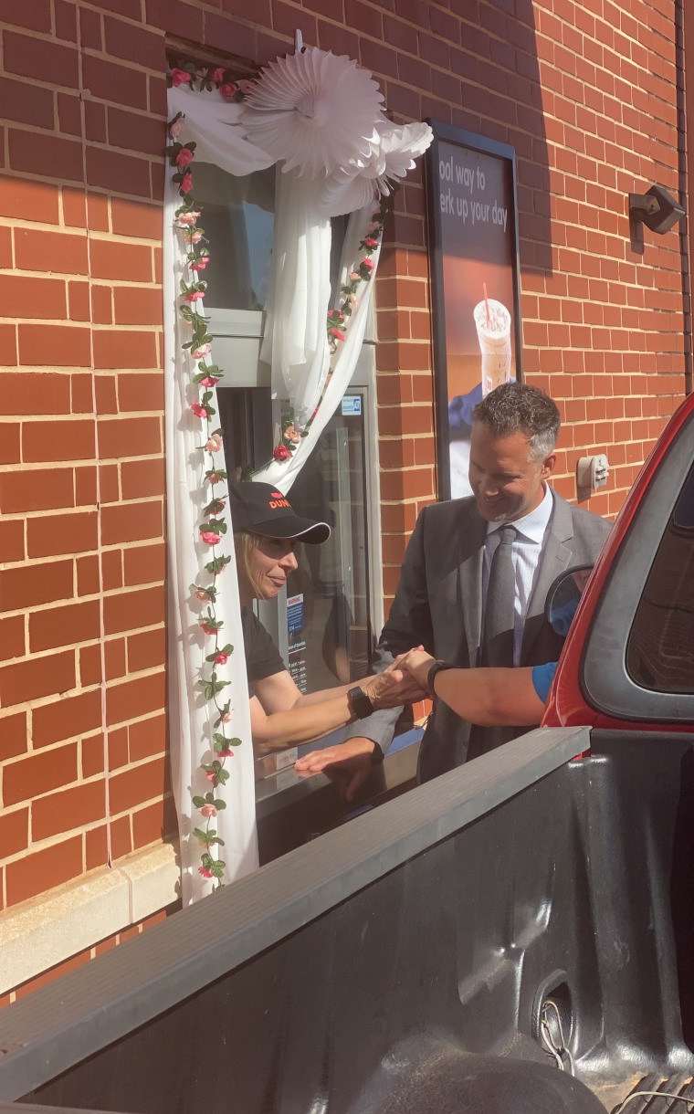 Sugar Good and John Thompson wed this month in the very place they first met: the Dunkin' drive-thru.