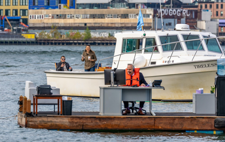 A couple on a private boat sailed past, and their reactions are priceless. 