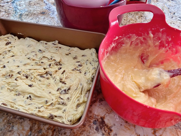 On the left: the initial layer of batter, pressed into the pan. On the right: the cream cheese, powdered sugar and egg topping.