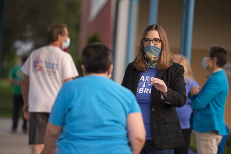 Transgender activist Sarah McBride, who hopes to win a seat in the Delaware Senate, campaigns at Maple Lane Elementary in Claymont, Del., on Sept. 15, 2020.