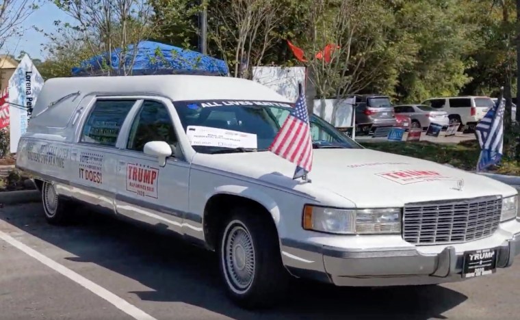A hearse decorated with slogans about Democratic voters at a community center in Montgomery County, Texas, on Saturday.