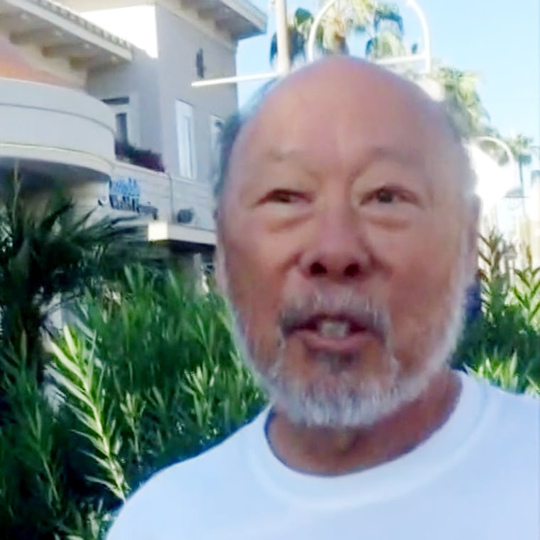 A man identified as Paul Ng was arrested and fired from his job after he was seen in a video using a racial slur while confronting two Black men.