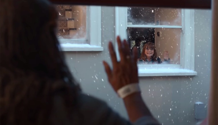 When the older woman appears in her window again, she's seen wearing a hospital bracelet.