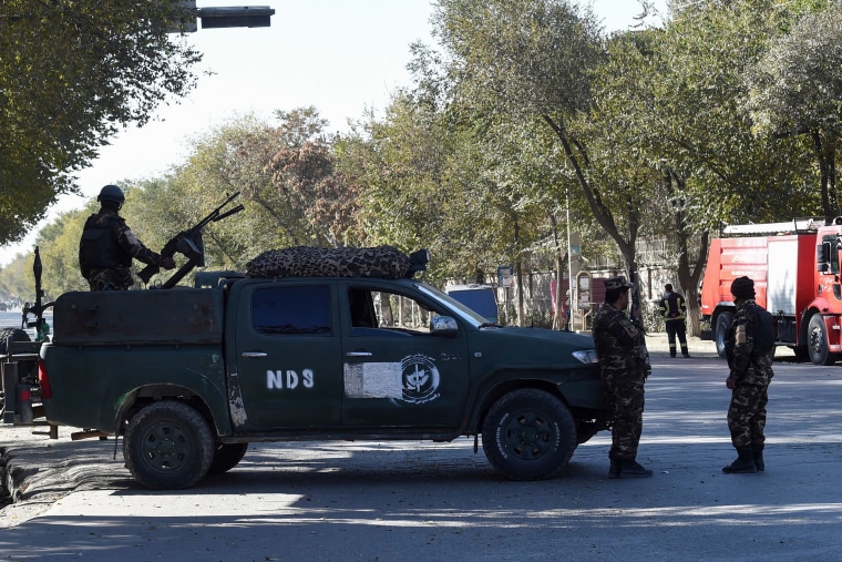 Image: Security personnel outside the Kabul University 