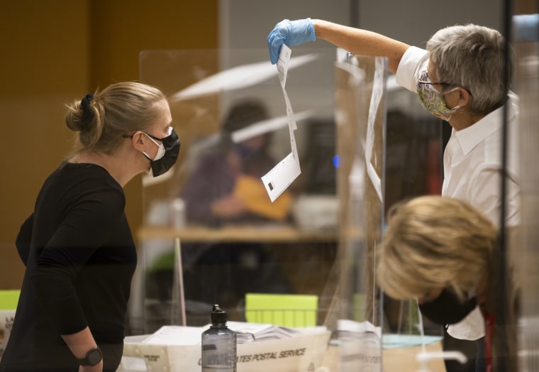 Image: Absentee Ballots Are Counted In Minnesota Ahead Of Election Day
