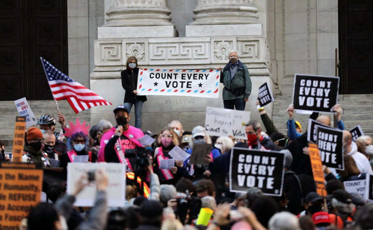 Image: People attend a rally at the New York Public Library, the day after Election day, in Manhattan