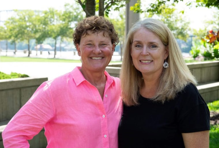 Charmaine McGuffey, left, with her wife, Christine Sandusky.