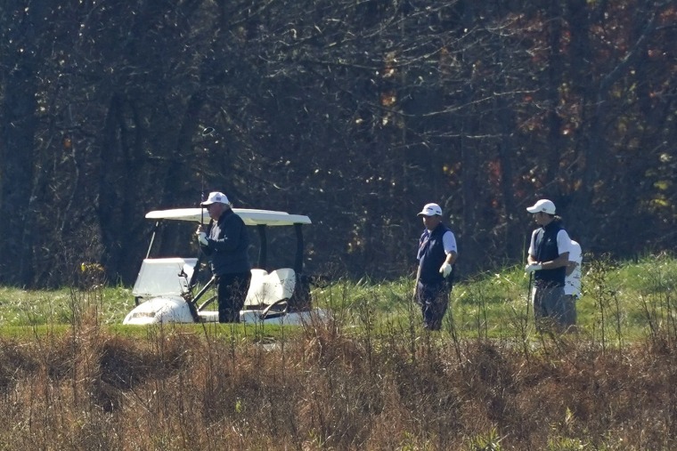 Image: President Donald Trump plays a round of golf at Trump National Golf Course in Sterling, Va., on Saturday.