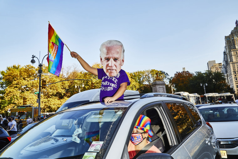 New Yorkers celebrate Joe Biden winning the presidency at Columbus Circle.