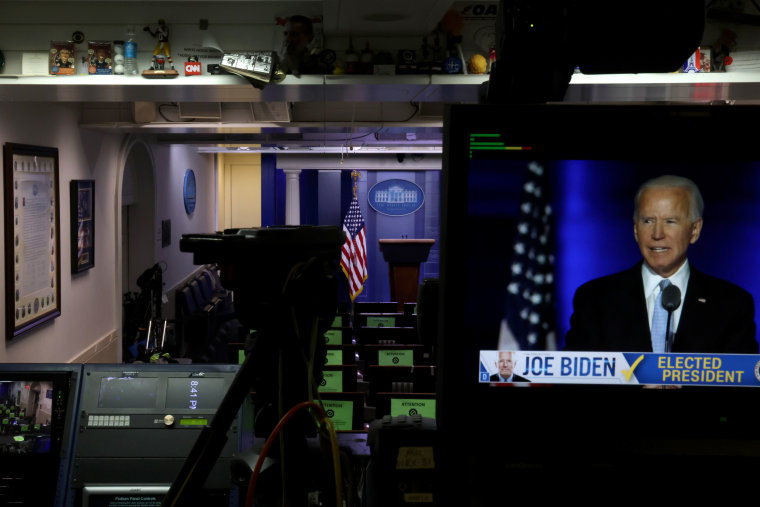 Image: President-elect Joe Biden's address to the nation is broadcast on a television inside the empty White House briefing room on Nov. 7, 2020.