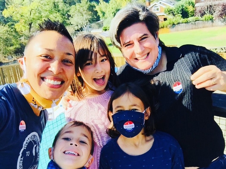 Fiona Miller and her wife snapped a photo with their children after voting in the historic election.